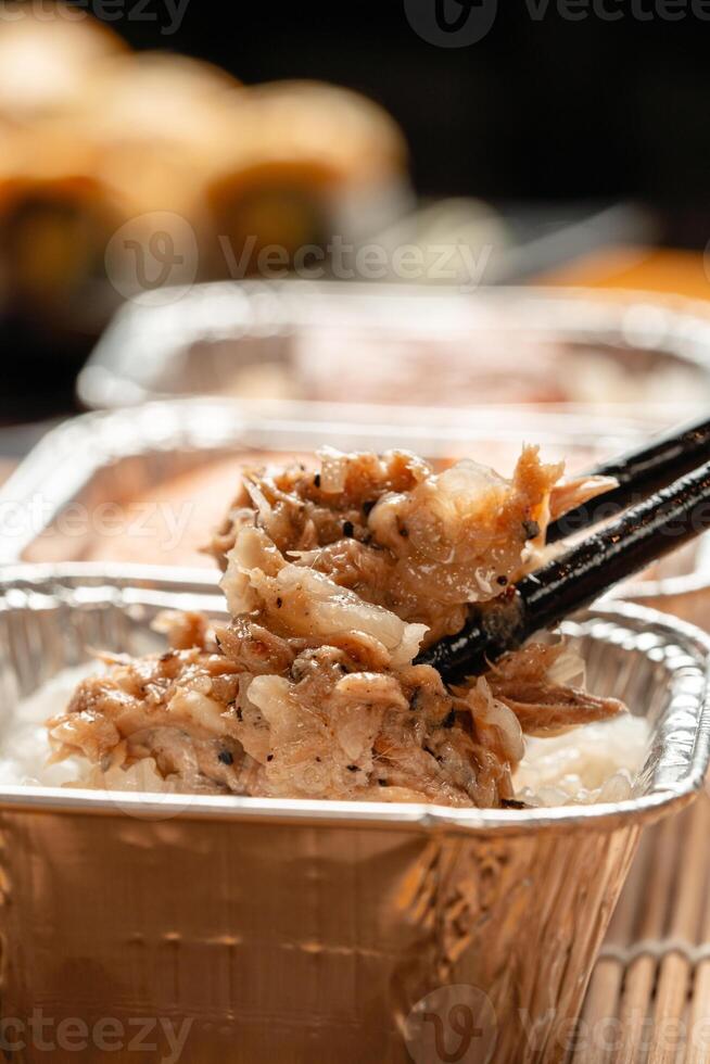 sushi is a Japanese dish of prepared vinegared rice, usually with some sugar and salt, accompanied by a variety of ingredients such as seafood, often raw and vegetables. photo