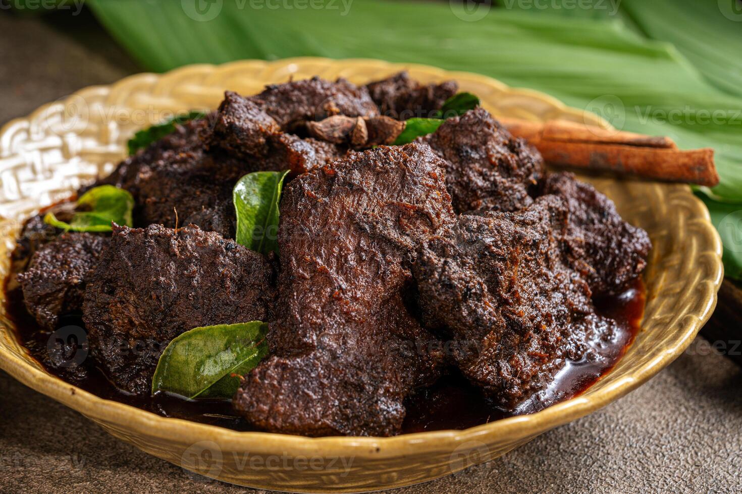 Beef Rendang is a Minang dish originating from the Minangkabau region in West Sumatra, Indonesia photo