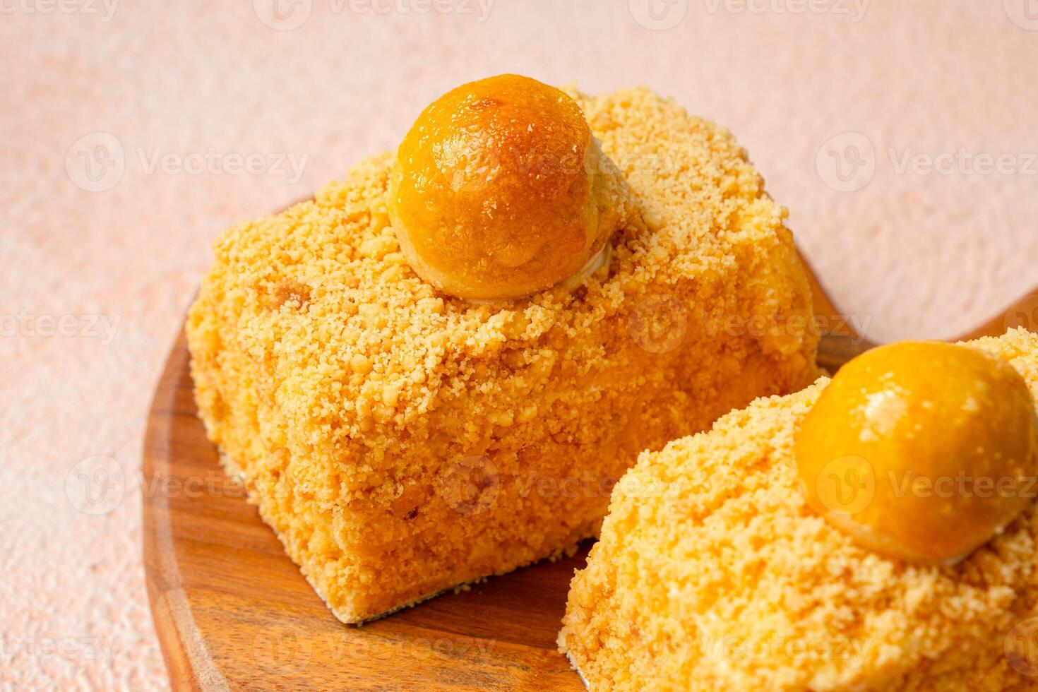 Nastar Cake is vanilla sponge based with crumbs, layered by pineapple jam and cheese cream. Topping with nastar cookies crumbs photo