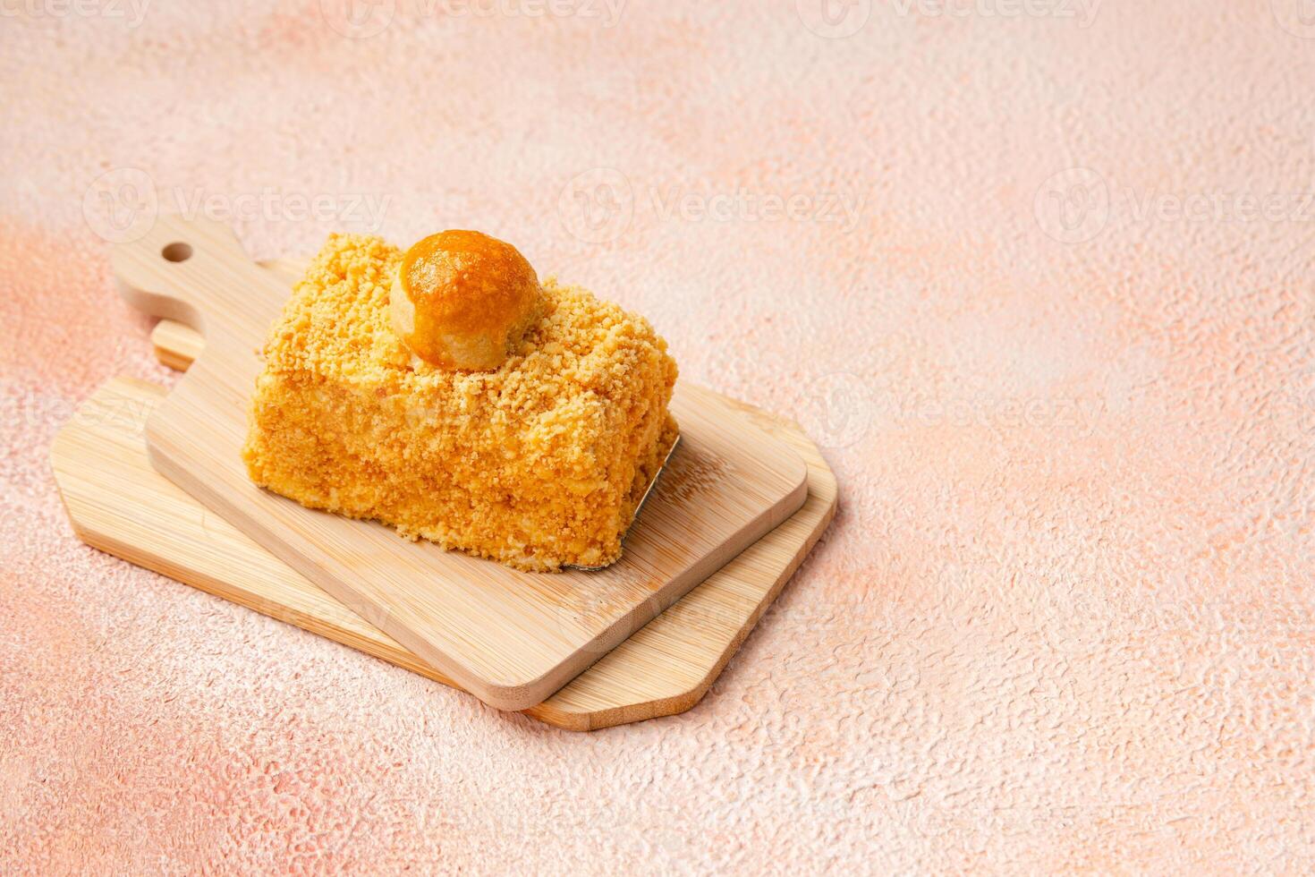Nastar Cake is vanilla sponge based with crumbs, layered by pineapple jam and cheese cream. Topping with nastar cookies crumbs photo