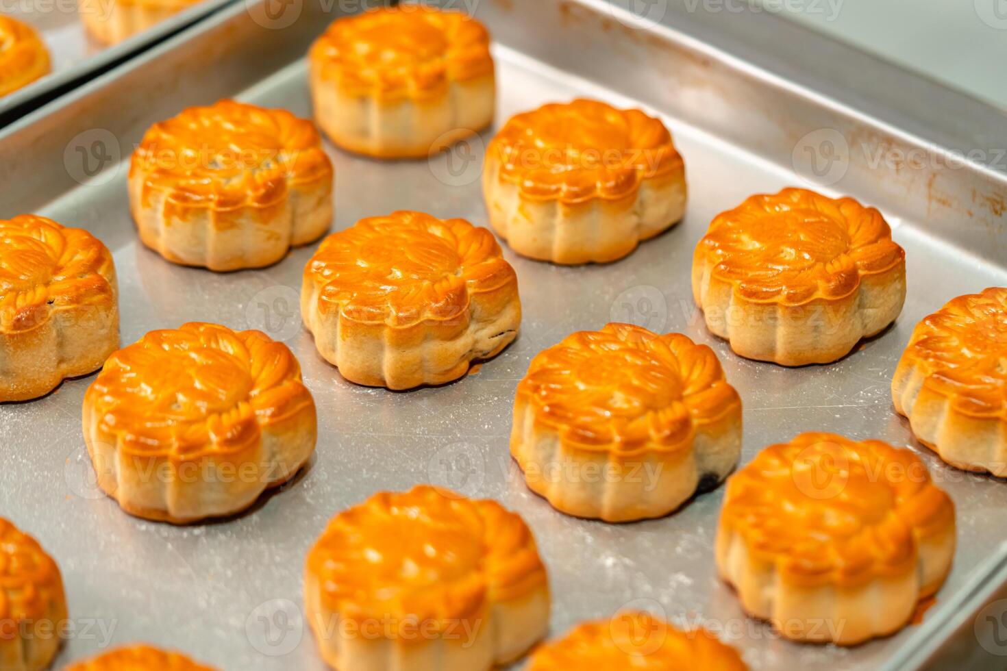 Mooncake making process. A mooncake is a Chinese bakery product traditionally eaten during the Mid Autumn Festival. photo