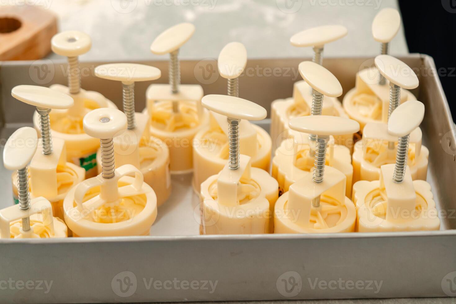 Mooncake making process. A mooncake is a Chinese bakery product traditionally eaten during the Mid Autumn Festival. photo