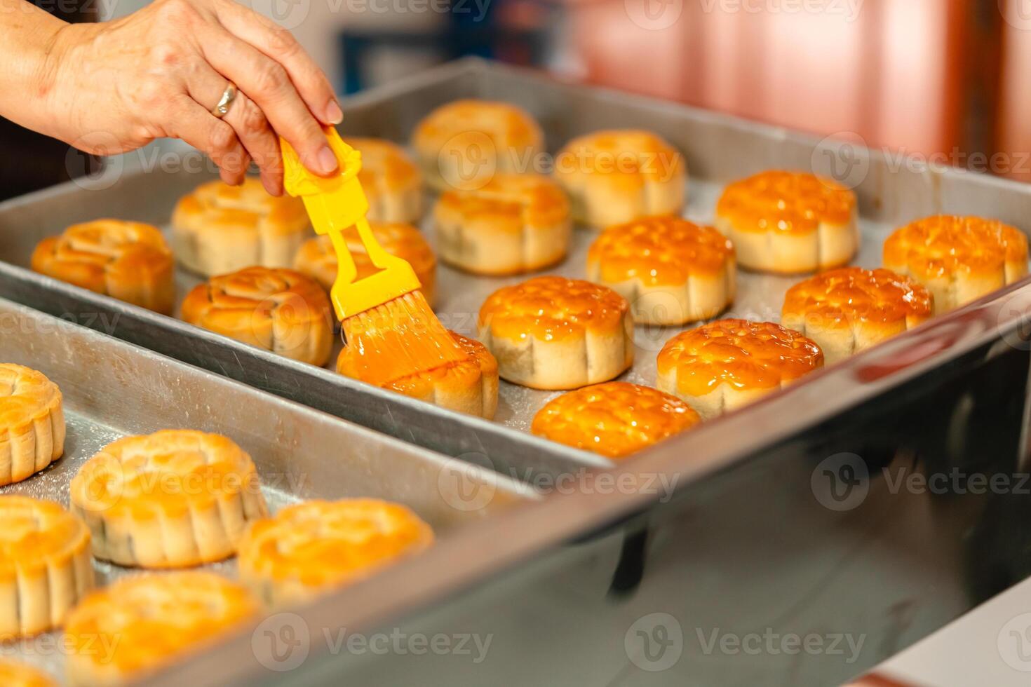 Mooncake making process. A mooncake is a Chinese bakery product traditionally eaten during the Mid Autumn Festival. photo