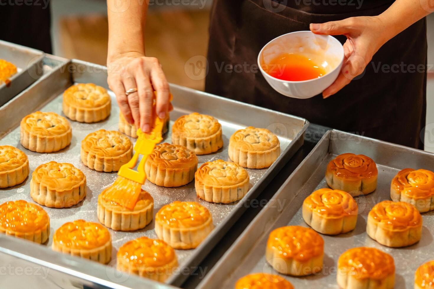 Mooncake making process. A mooncake is a Chinese bakery product traditionally eaten during the Mid Autumn Festival. photo