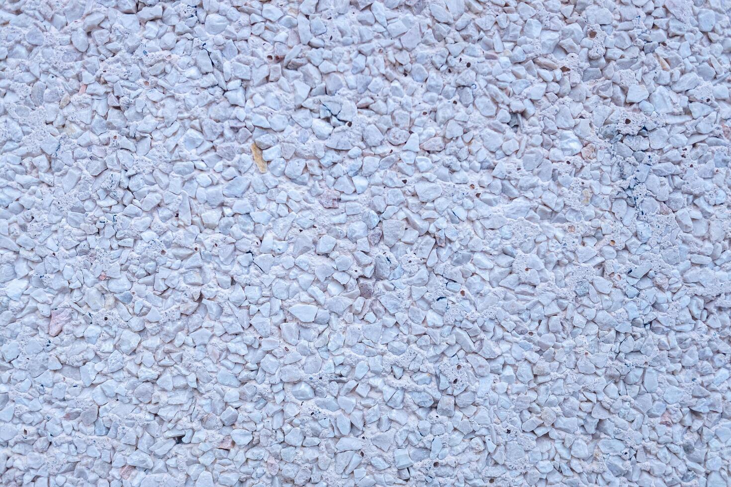 detail of a wall coated with gravel, background textured photo