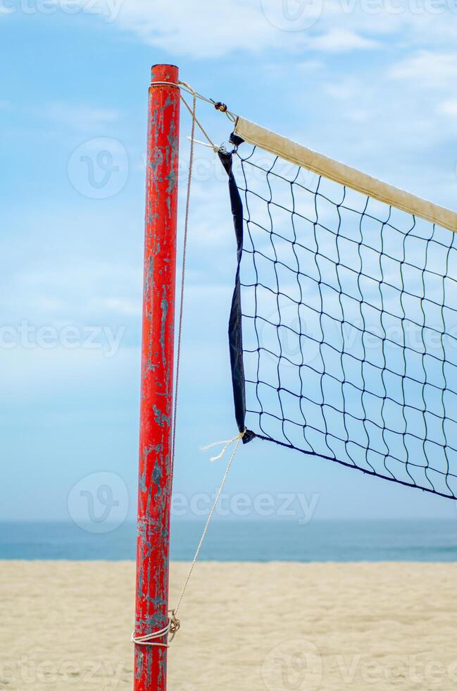 partial view of a volleyball net on the beach, summer concept photo