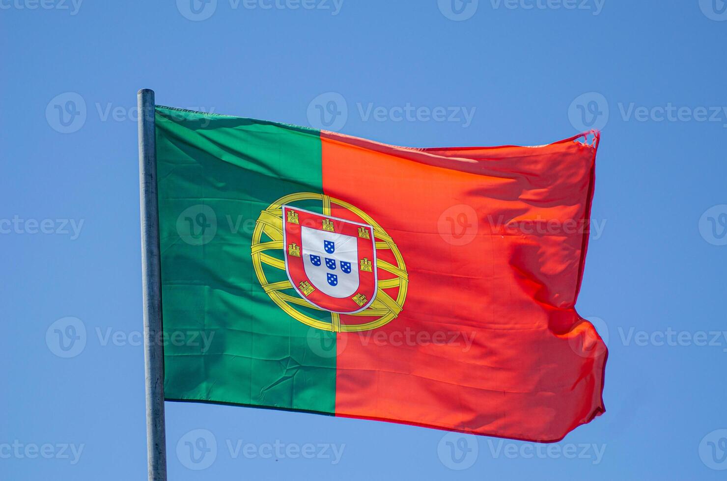 Portugal flag blowing in the wind photo