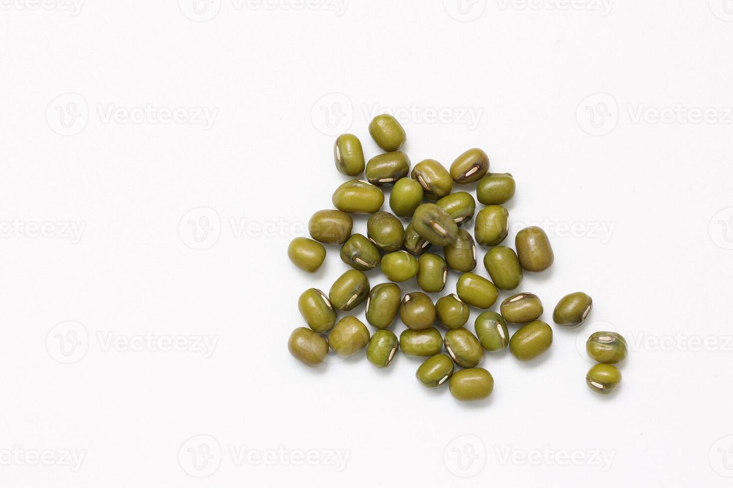 Top view of green mung beans on white background, mung beans seeds photo
