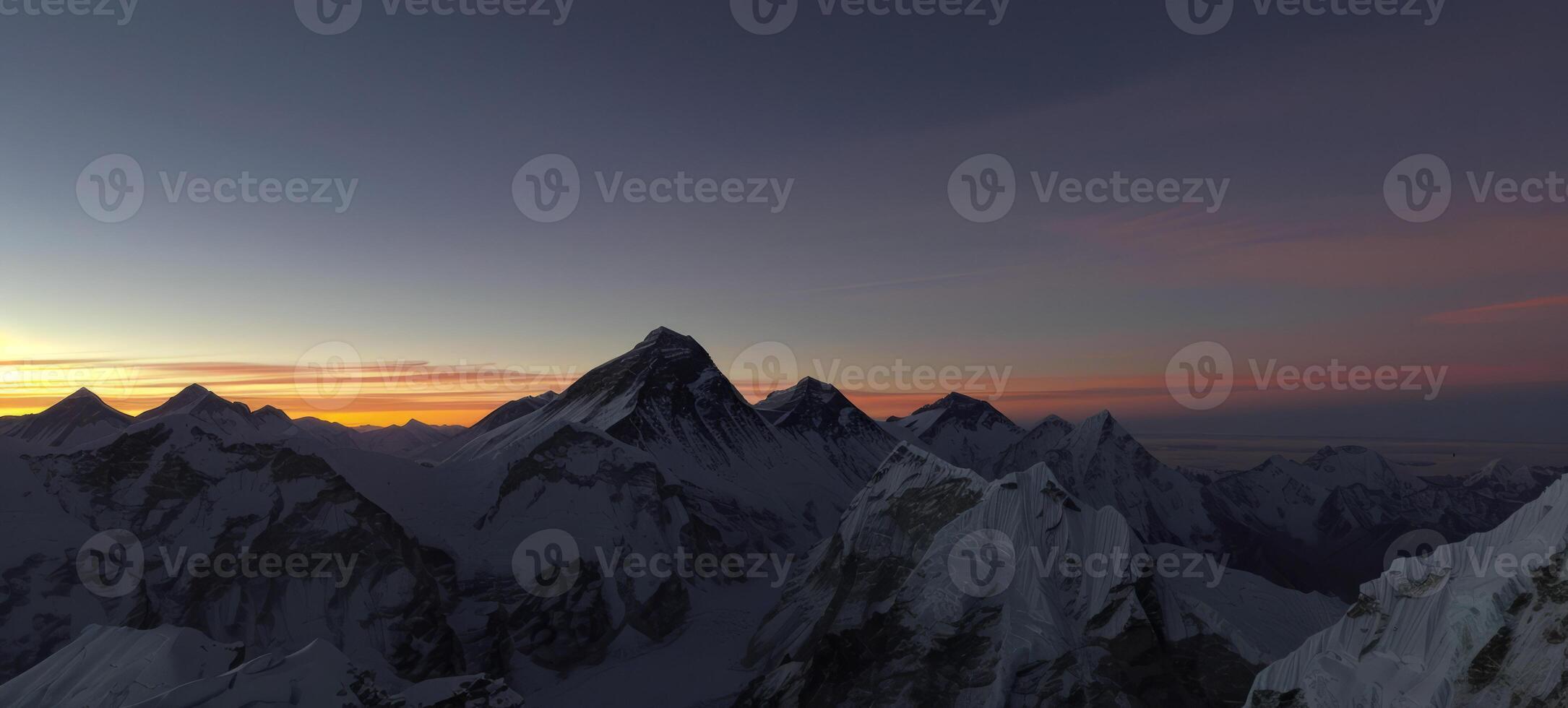 Majestic Himalayan Sunrise Breathtaking View of Snow-Capped Peaks and Serene Sky at Dawn photo