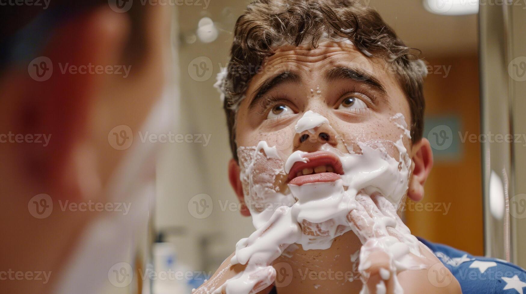 Young man with Down syndrome concentrating on shaving in front of a mirror photo