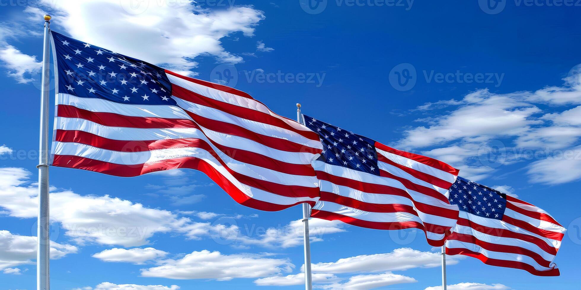 Row of American Flags Against Blue Sky photo