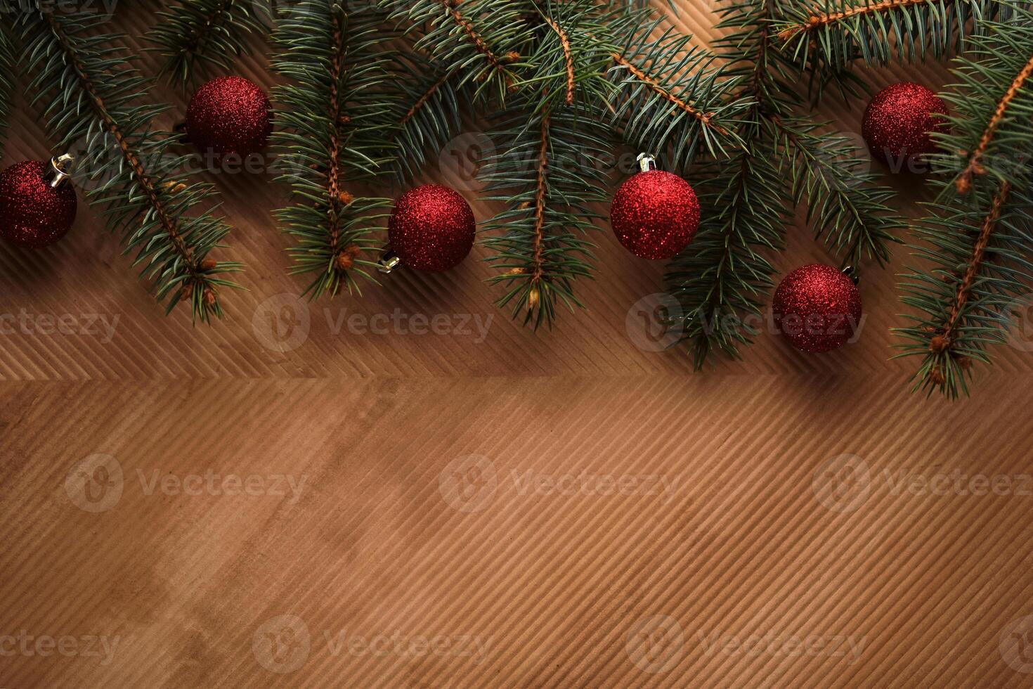 Abstract Christmas and New Year's background with Christmas tree and red Christmas balls. photo