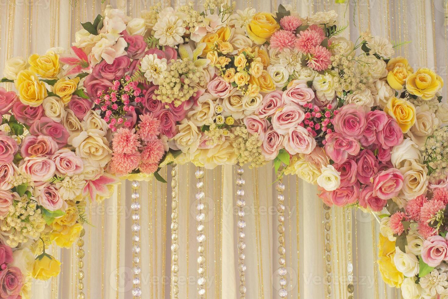 Beautiful Artificial Flowers in colorful composition with bling diamond beads Background photo