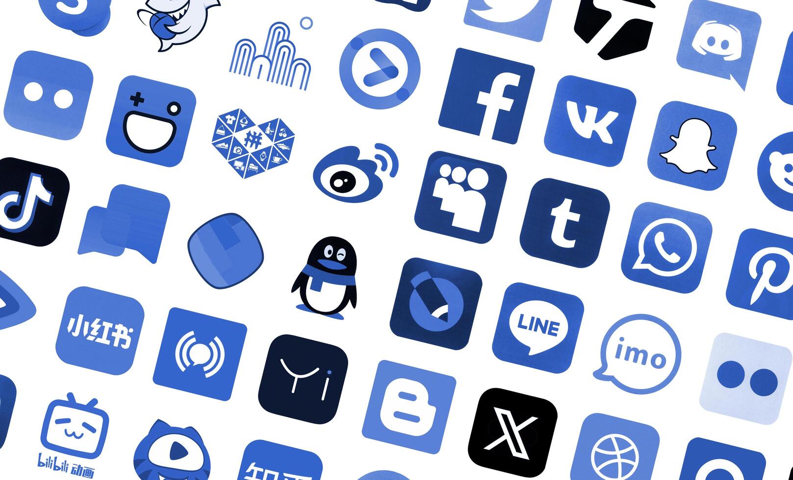 KYIV, UKRAINE - APRIL 1, 2024 Many icons of social media, messengers, sharing platforms photo