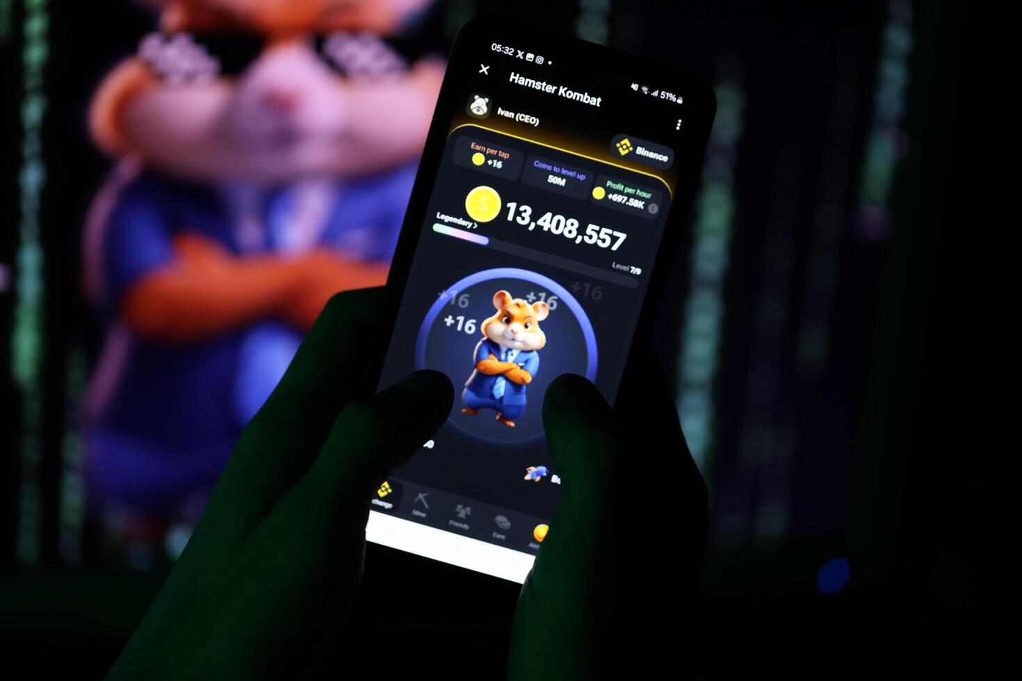 KYIV, UKRAINE - APRIL 20, 2024 Hamster Kombat telegram bot on smartphone screen. Hamster Kombat is a viral Telegram-based crypto game for earn HMSTR tokens by managing virtual crypto exchange photo