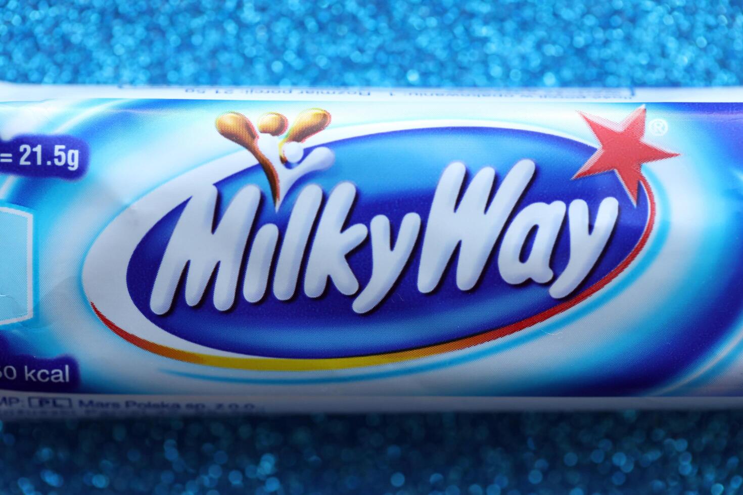 KYIV, UKRAINE - APRIL 20, 2024 Milky Way or MilkyWay small chocolate bar. Milky Way bars is worldwide famous product photo