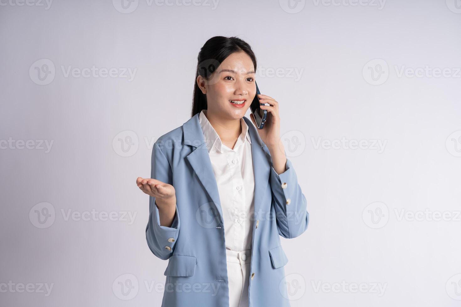 Portrait of young businesswoman posing on white background photo
