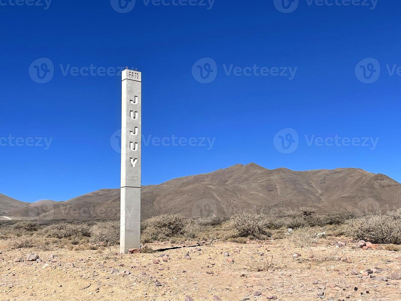 Obelisk with the Jujuy inscription in the Andes, Jujuy region, Argentina photo