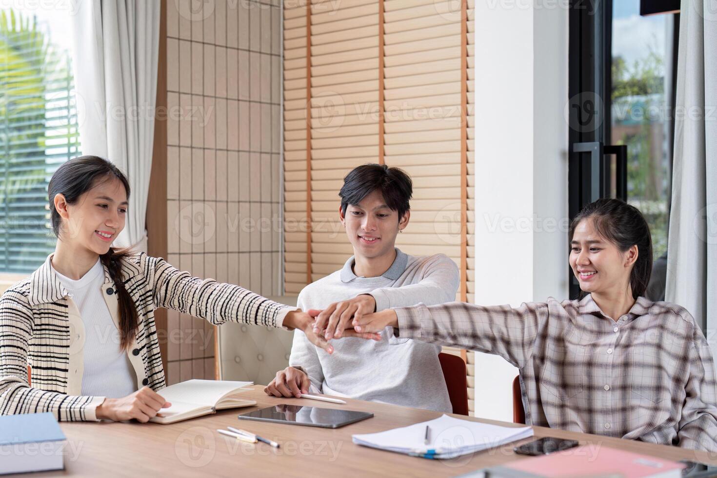 Group of Diverse Students Collaborationg and Study Together in a Modern Classroom Setting photo