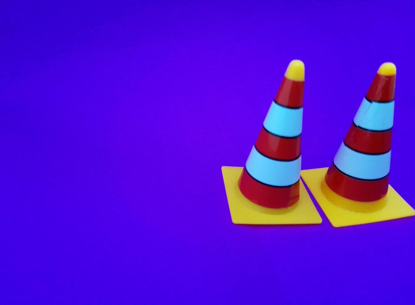 Toy traffic sign on a blue background photo