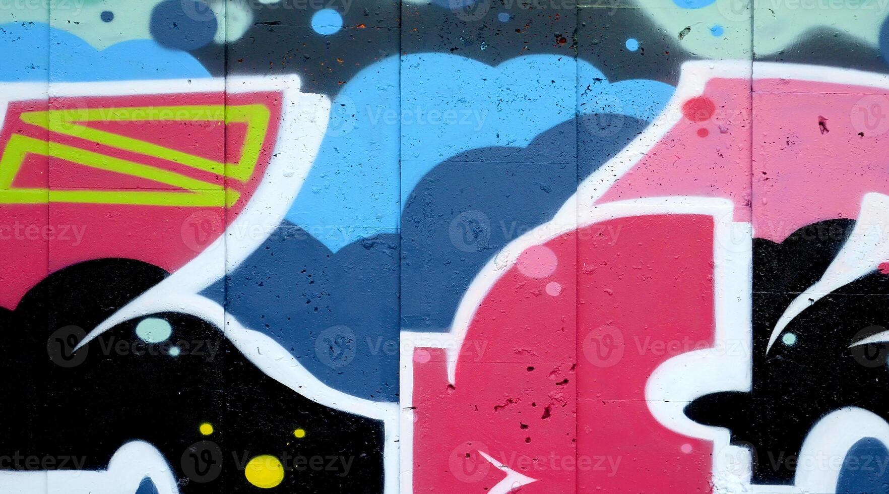 Colorful background of graffiti painting artwork with bright aerosol outlines on wall. Old school street art piece made with aerosol spray paint cans. Contemporary youth culture photo