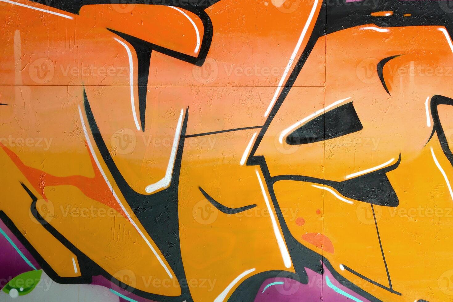 Colorful background of graffiti painting artwork with bright aerosol outlines on wall. Old school street art piece made with aerosol spray paint cans. Contemporary youth culture photo