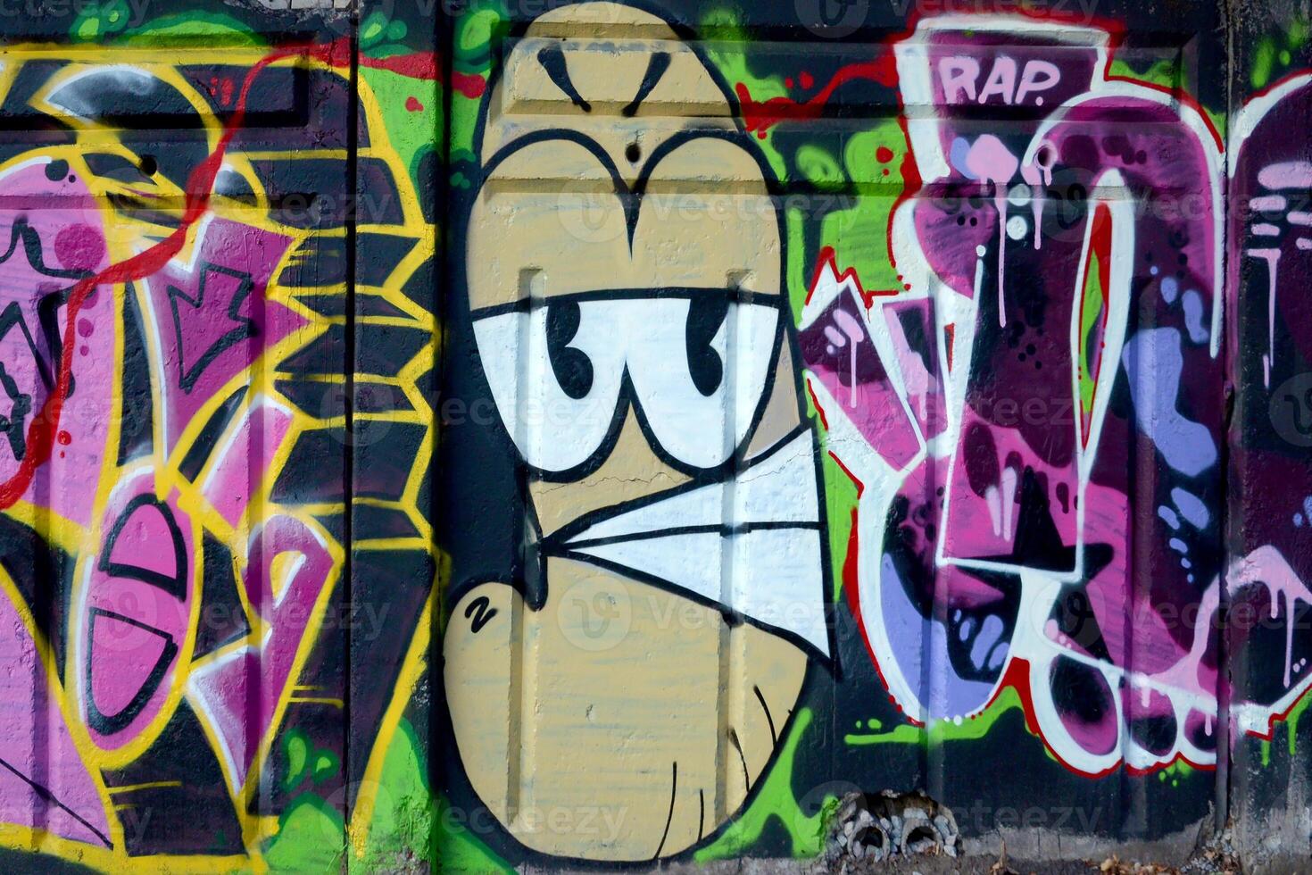 Colorful background of graffiti painting artwork with bright aerosol outlines on wall. Old school street art piece made with aerosol spray paint cans. Contemporary youth culture photo