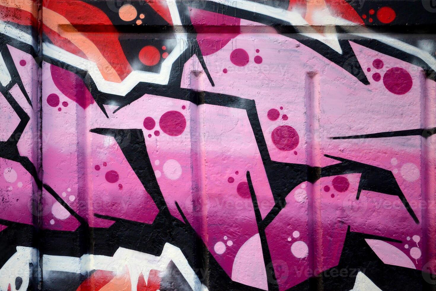 Colorful background of graffiti painting artwork with bright aerosol outlines on wall. Old school street art piece made with aerosol spray paint cans. Contemporary youth culture photo