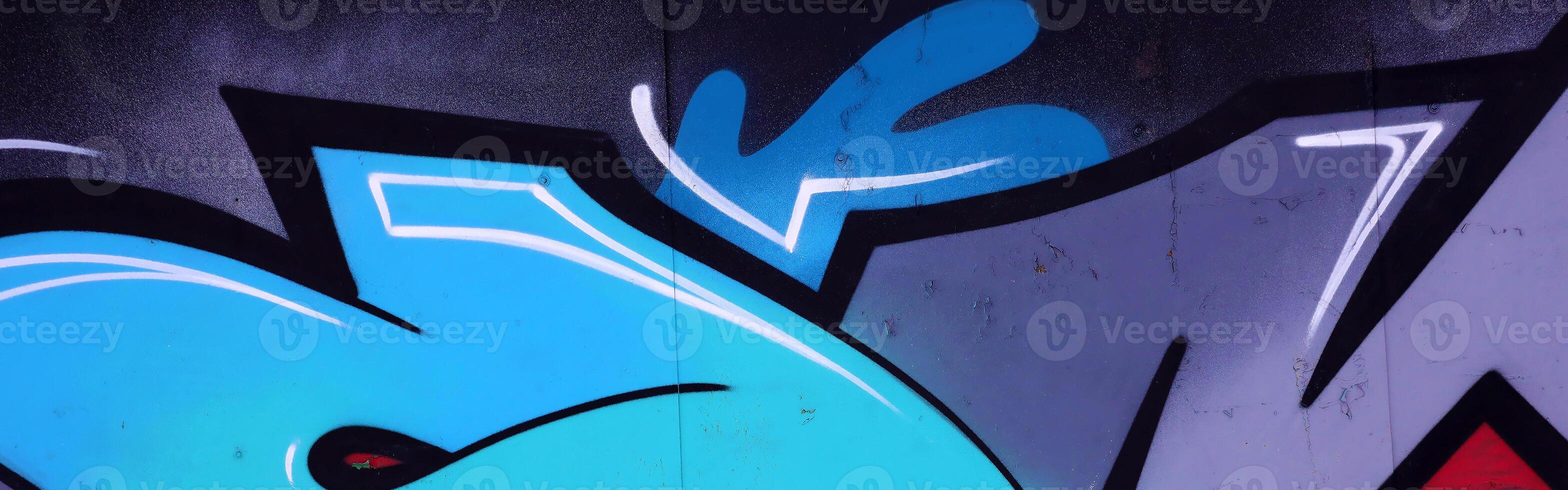 Colorful background of graffiti painting artwork with bright aerosol outlines on wall. Old school street art piece made with aerosol spray paint cans. Contemporary youth culture photo