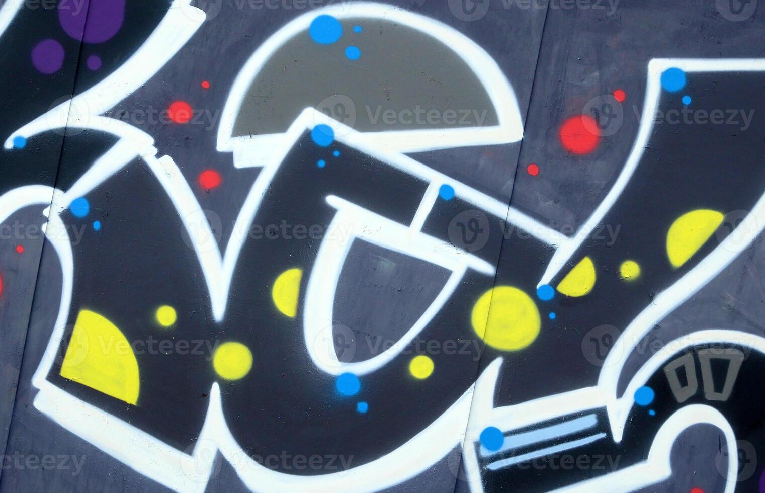Colorful background of graffiti painting artwork with bright aerosol outlines on wall. Old school street art piece made with aerosol spray paint cans. Contemporary youth culture photo