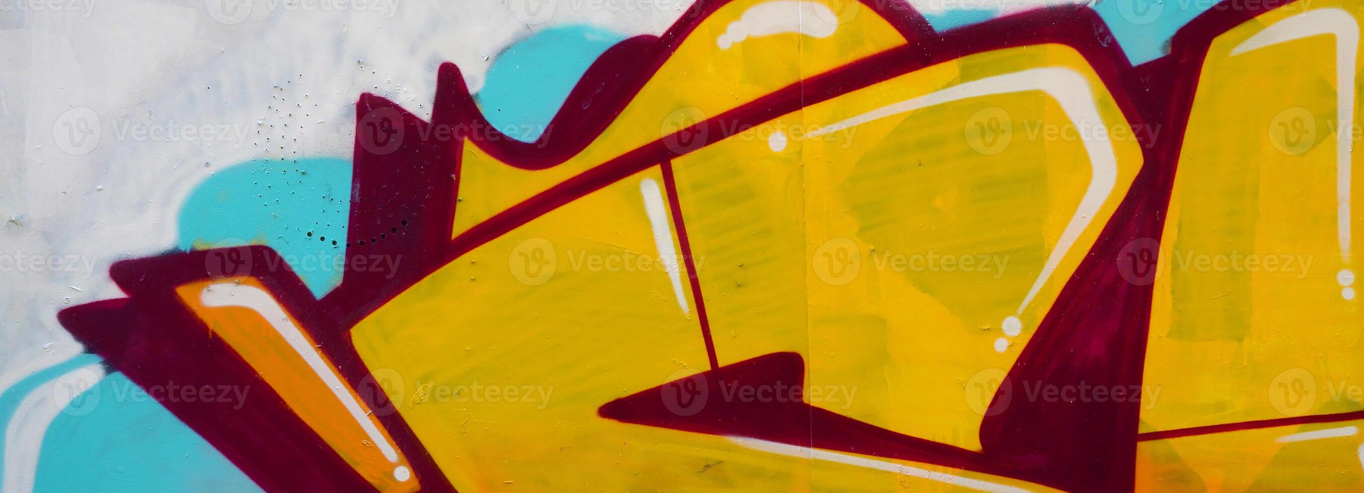 Colorful background of graffiti painting artwork with bright aerosol outlines on wall. Old school street art piece made with aerosol spray paint cans. Contemporary youth culture photo