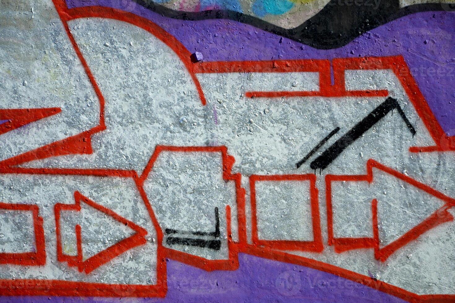 Colorful background of graffiti painting artwork with bright aerosol outlines on wall. Old school street art piece made with aerosol spray paint cans. Contemporary youth culture photo