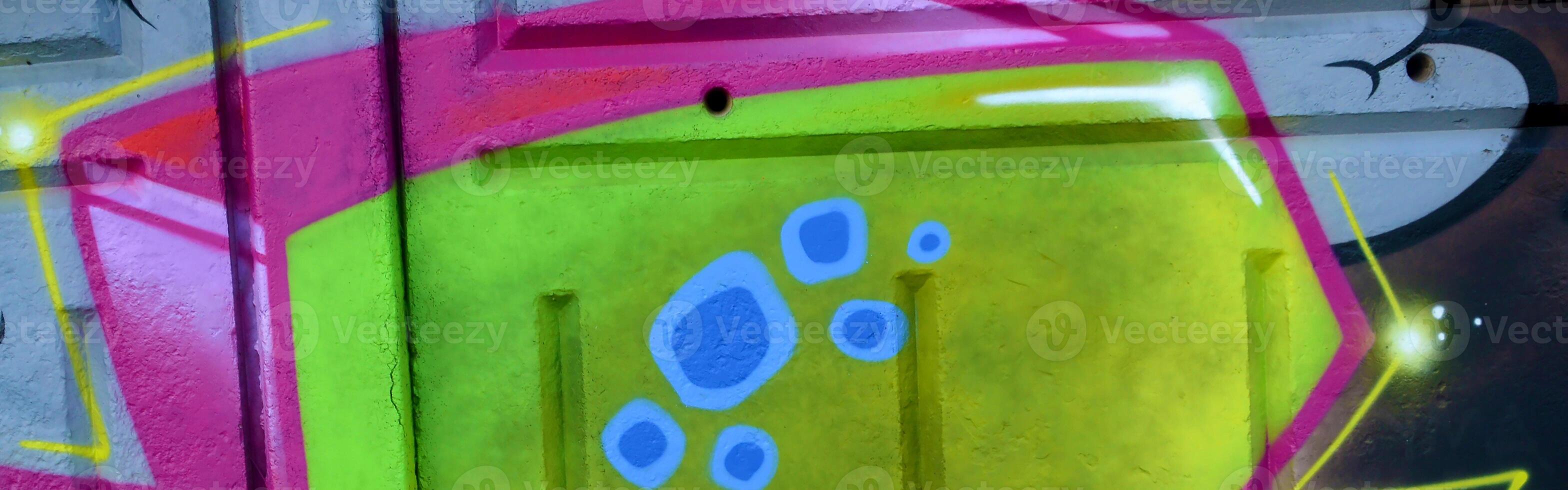 Colorful background of graffiti painting artwork with bright aerosol outlines on wall. Old school street art piece made with aerosol spray paint cans. Contemporary youth culture photo