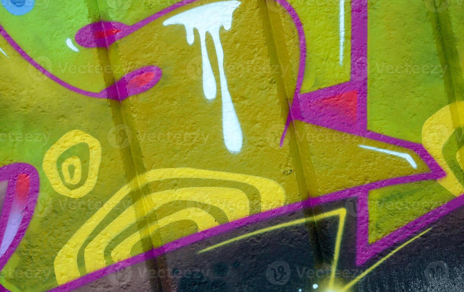 Colorful background of graffiti painting artwork with bright aerosol outlines on wall. Old school street art piece made with aerosol spray paint cans. Contemporary youth culture photo