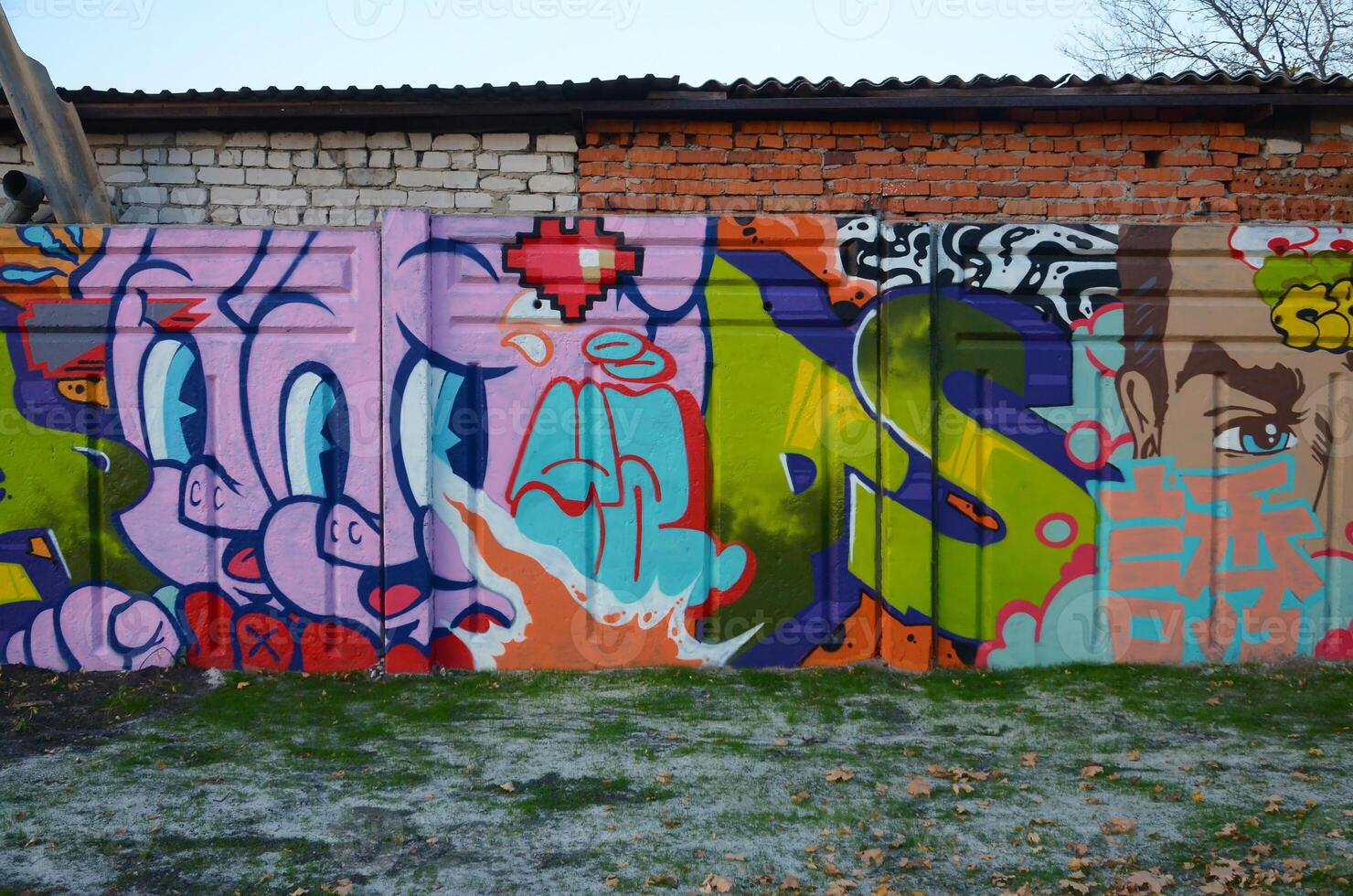 Colorful background of graffiti painting artwork with bright aerosol outlines on wall. Old school street art piece made with aerosol spray paint cans. Contemporary youth culture photo