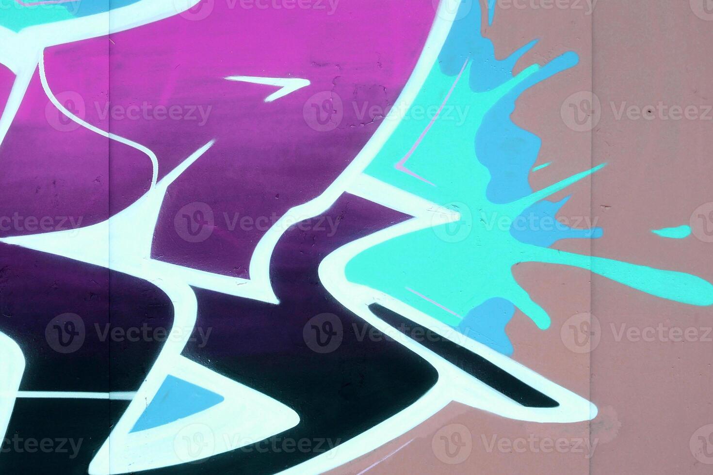 Colorful background of graffiti painting artwork with bright aerosol outlines on wall. Old school street art piece made with aerosol spray paint cans. Contemporary youth culture photo