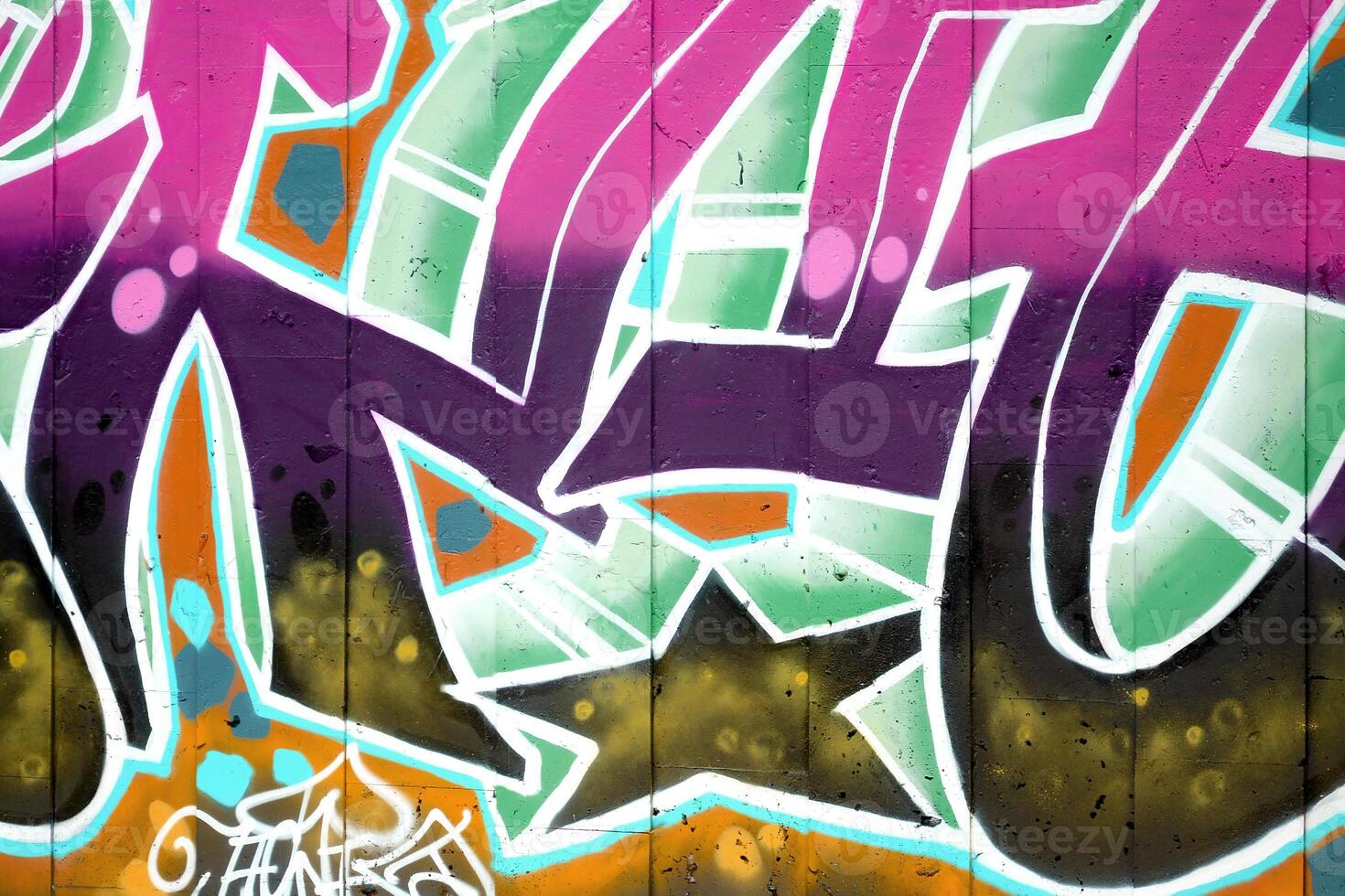 Colorful background of graffiti painting artwork with bright aerosol outlines on wall. Old school street art piece made with aerosol spray paint cans. Contemporary youth culture photo