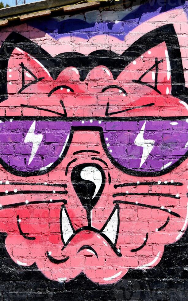 Colorful background of graffiti painting artwork with bright aerosol outlines on wall. Old school street art piece made with aerosol spray paint cans. Contemporary youth culture photo