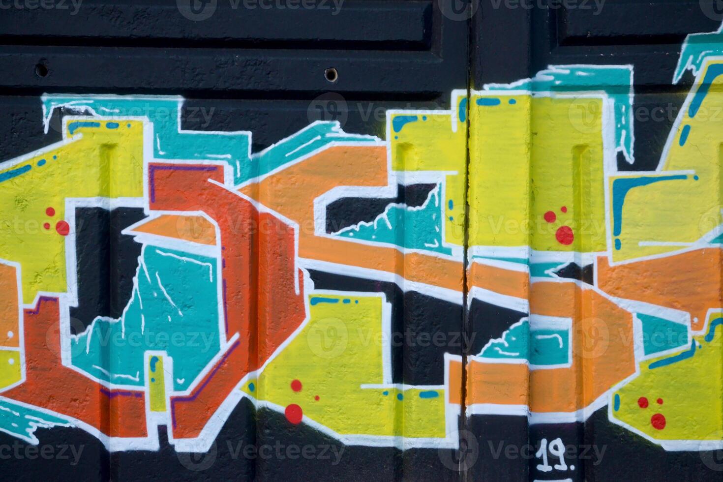Colorful background of graffiti painting artwork with bright aerosol outlines on wall. Old school street art piece made with aerosol spray paint cans. Contemporary youth culture photo