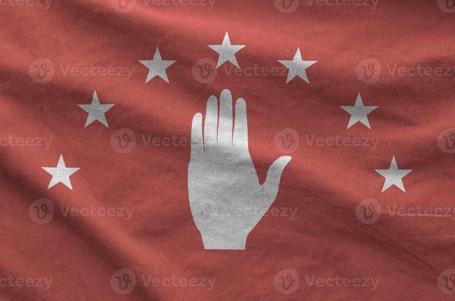 Abkhazia flag depicted on folded wavy fabric of old cloth photo