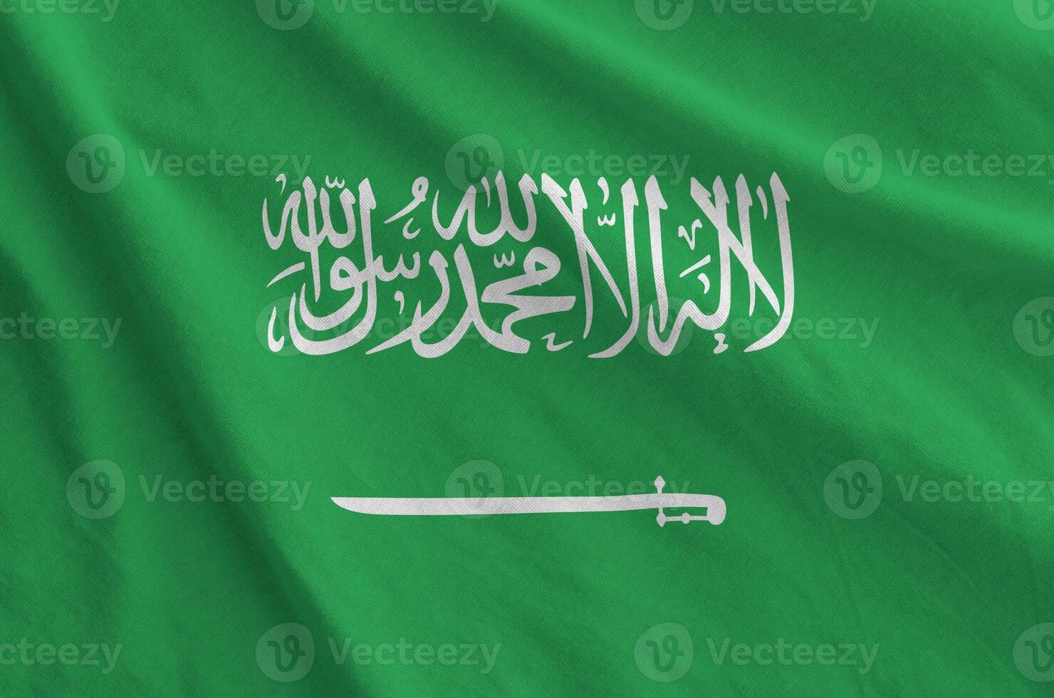 Saudi Arabia flag depicted on folded wavy fabric of old cloth photo