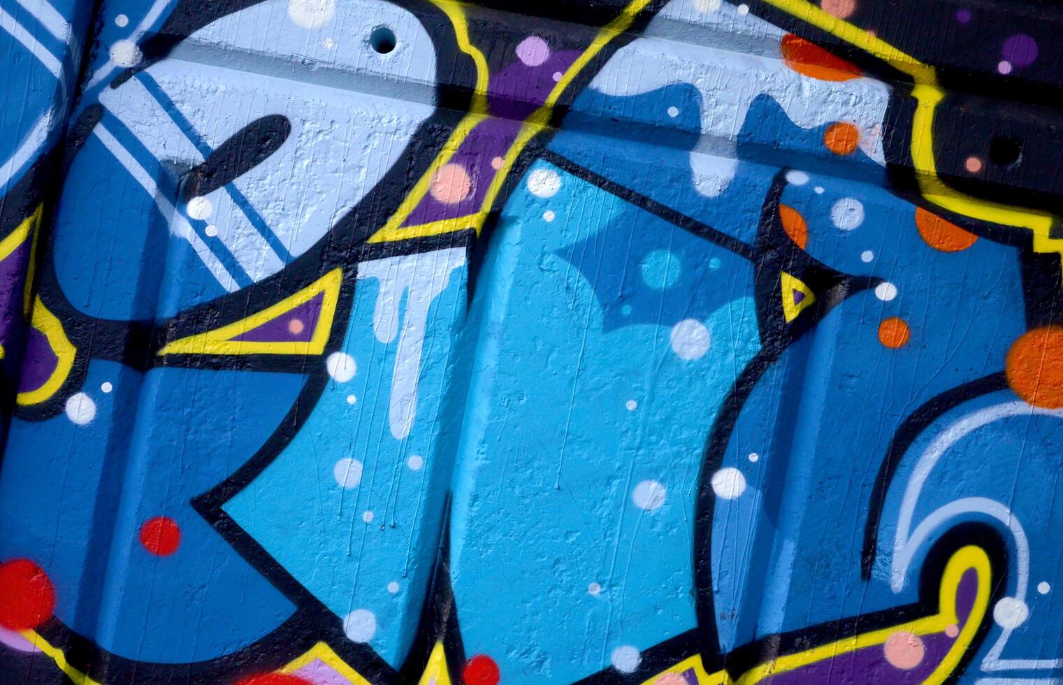 Colorful background of graffiti painting artwork with bright aerosol outlines on wall. Old school street art piece made with aerosol spray paint cans. Contemporary youth culture photo