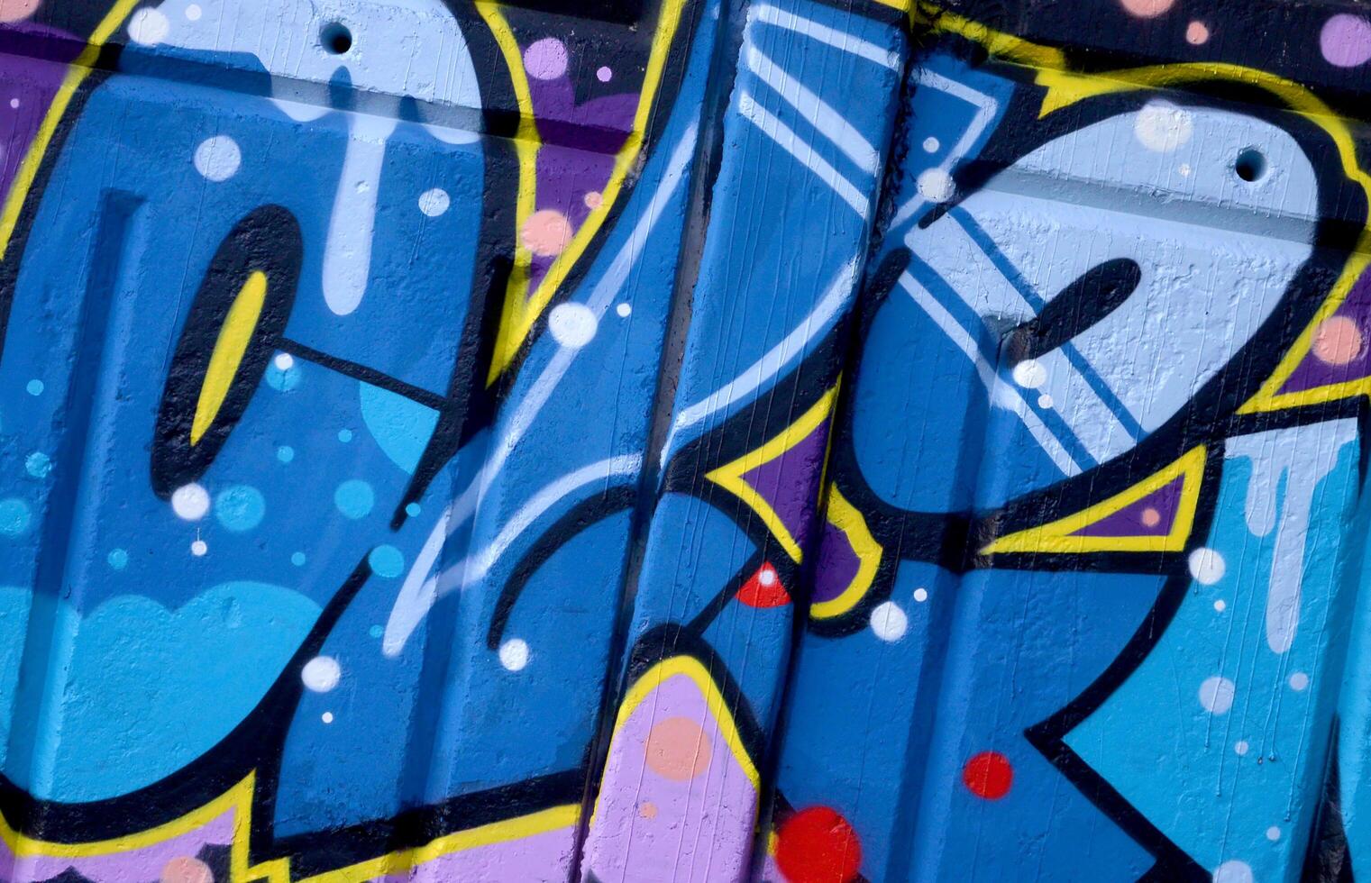 Colorful background of graffiti painting artwork with bright aerosol outlines on wall. Old school street art piece made with aerosol spray paint cans. Contemporary youth culture photo
