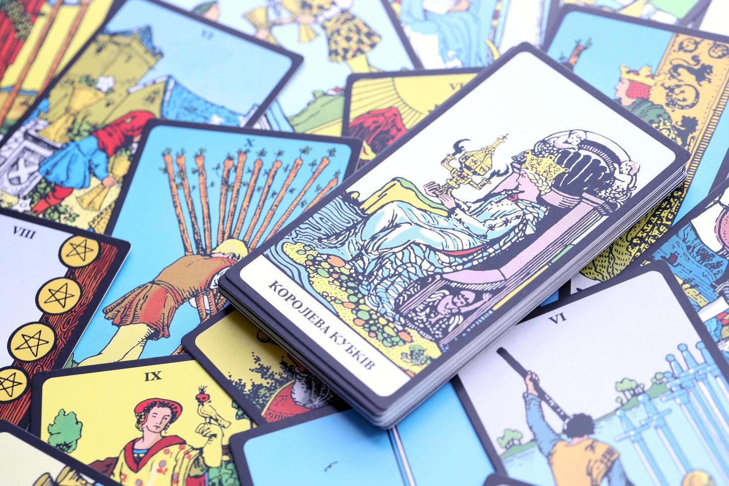 KYIV, UKRAINE - JULY 10, 2024 Tarot minor and major arcana cards of Rider Waite esoteric deck. Many tarot cards for fortune telling and esoteric actions photo