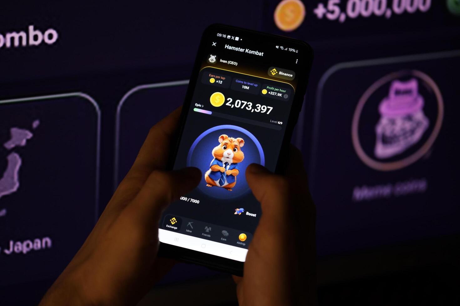 KYIV, UKRAINE - APRIL 20, 2024 Hamster Kombat telegram bot on smartphone screen. Hamster Kombat is a viral Telegram-based crypto game for earn HMSTR tokens by managing virtual crypto exchange photo