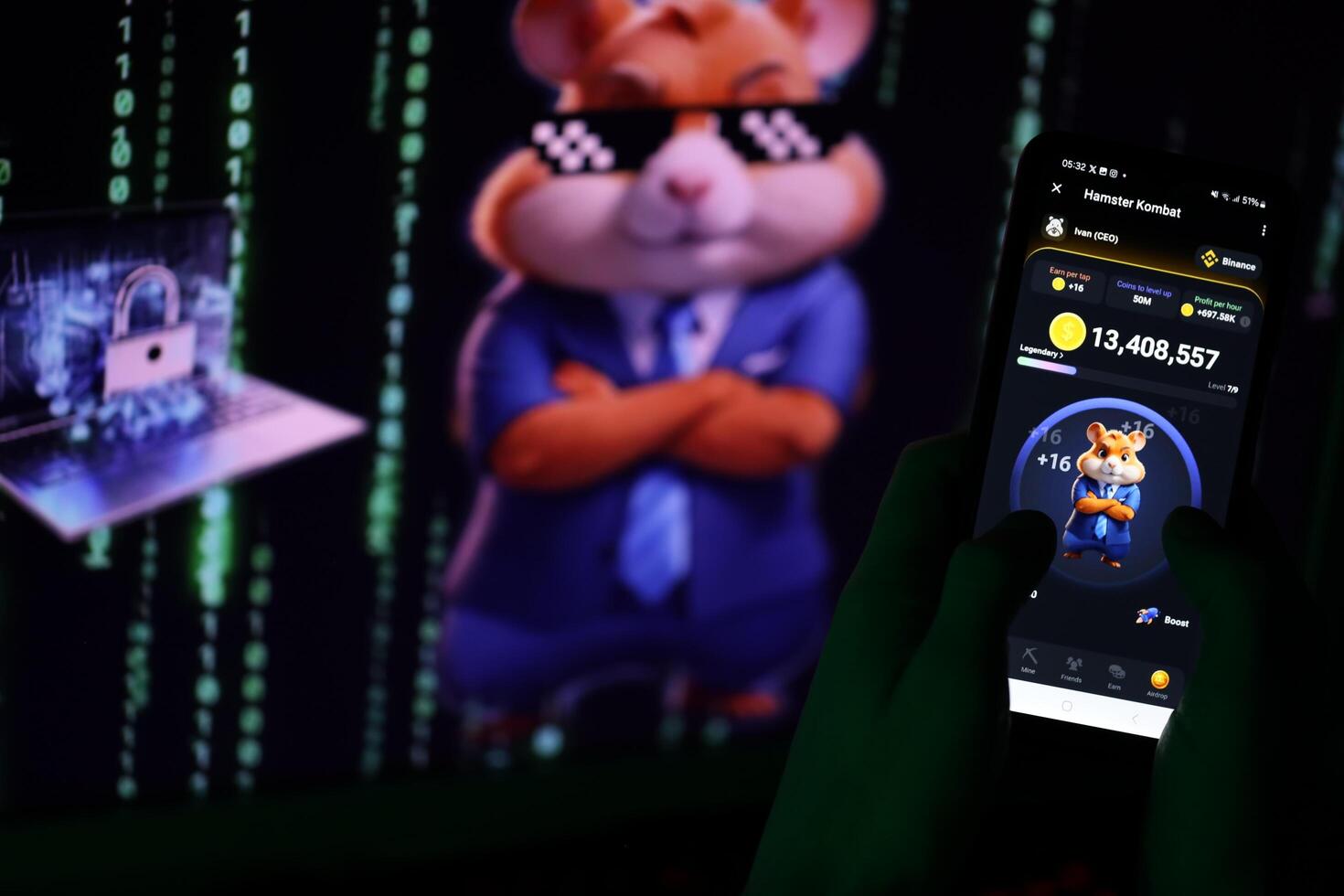 KYIV, UKRAINE - APRIL 20, 2024 Hamster Kombat telegram bot on smartphone screen. Hamster Kombat is a viral Telegram-based crypto game for earn HMSTR tokens by managing virtual crypto exchange photo