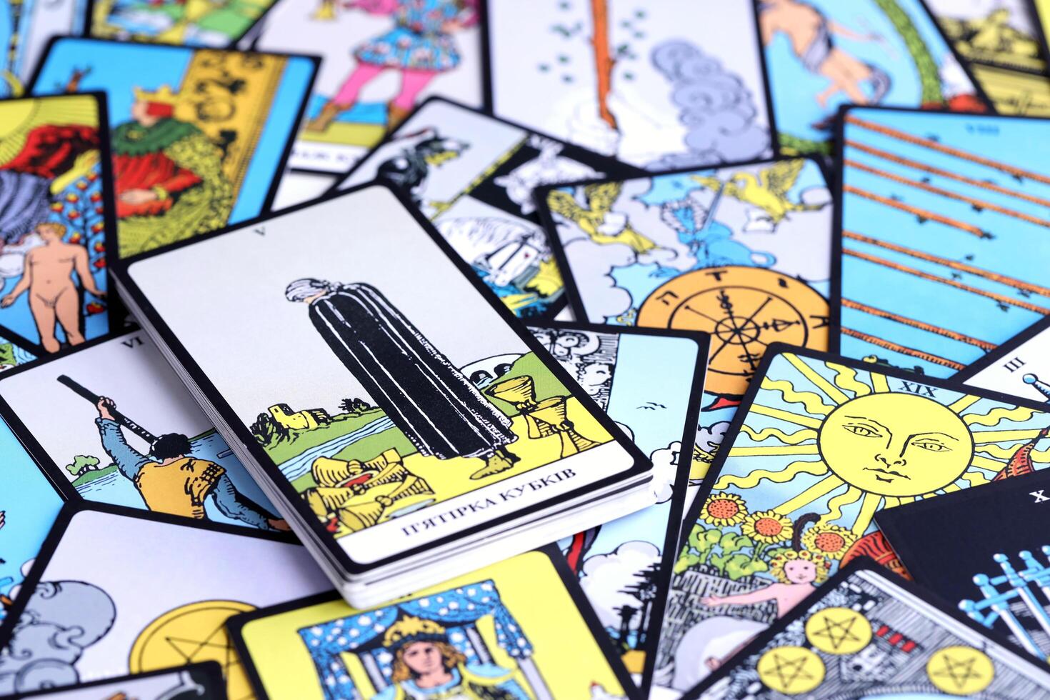 KYIV, UKRAINE - JULY 10, 2024 Tarot minor and major arcana cards of Rider Waite esoteric deck. Many tarot cards for fortune telling and esoteric actions photo