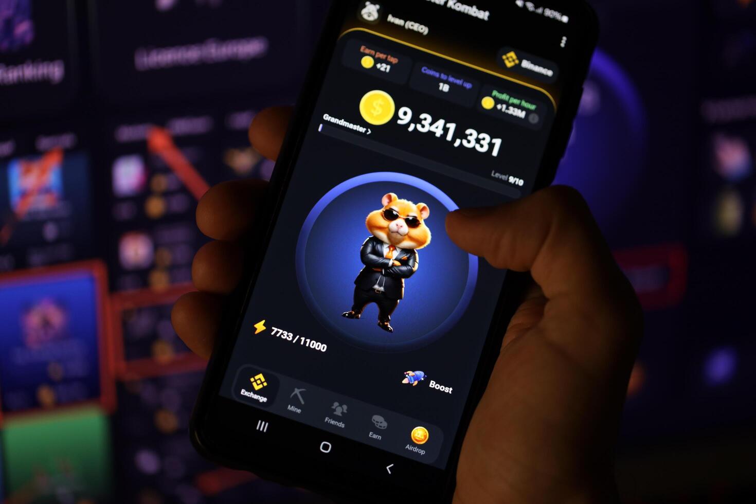 KYIV, UKRAINE - APRIL 20, 2024 Hamster Kombat telegram bot on smartphone screen. Hamster Kombat is a viral Telegram-based crypto game for earn HMSTR tokens by managing virtual crypto exchange photo