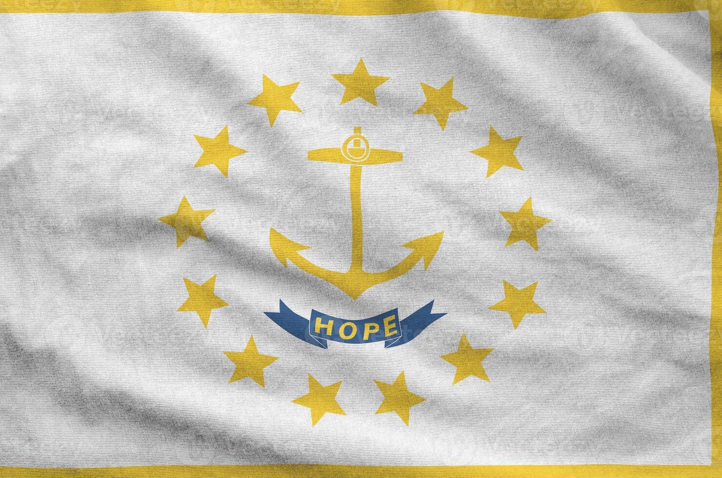 Rhode Island US state flag depicted on folded wavy fabric of old cloth photo