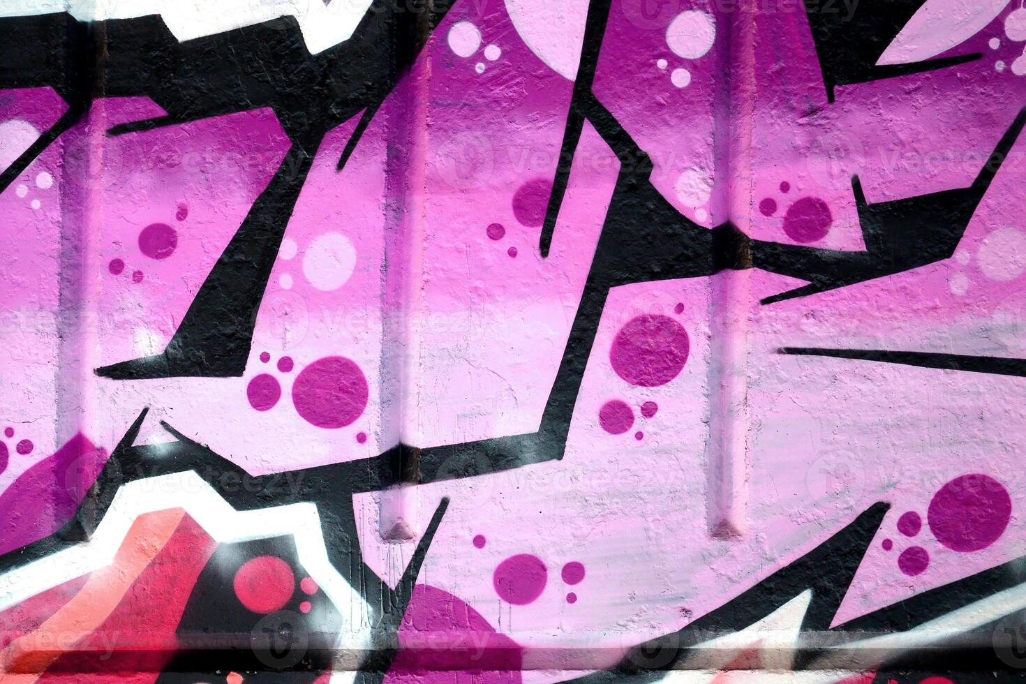 Colorful background of graffiti painting artwork with bright aerosol outlines on wall. Old school street art piece made with aerosol spray paint cans. Contemporary youth culture photo